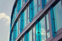 Blue brise soleil sun breakers on modern office glass building