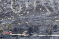 Le 22 août dernier, le paysage calciné de Carnoux-en-Provence (sud-est de la France) où 240 hectares de forêt sont partis en fumée.