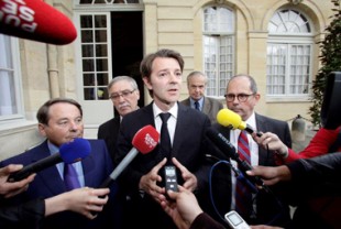 François Baroin, André Laignel et Philippe Laurent, à Matignon, jeudi 28 mai 2015