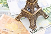 Eiffel tower model with Euro banknotes