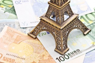 Eiffel tower model with Euro banknotes