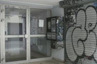 hall d'immeuble dégradé