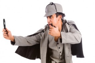 Curious Sherlock Holmes pipe and magnifying glass